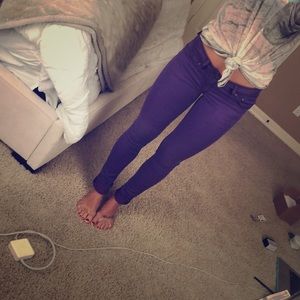 Women’s purple skinny jeans; size 0